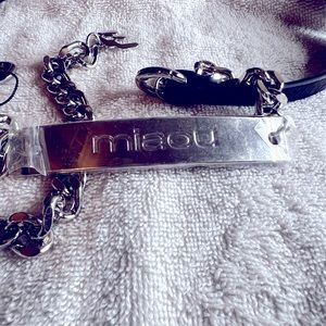 MAIOU ladies belt.  Leather black waist strap with silver metal chain and logo